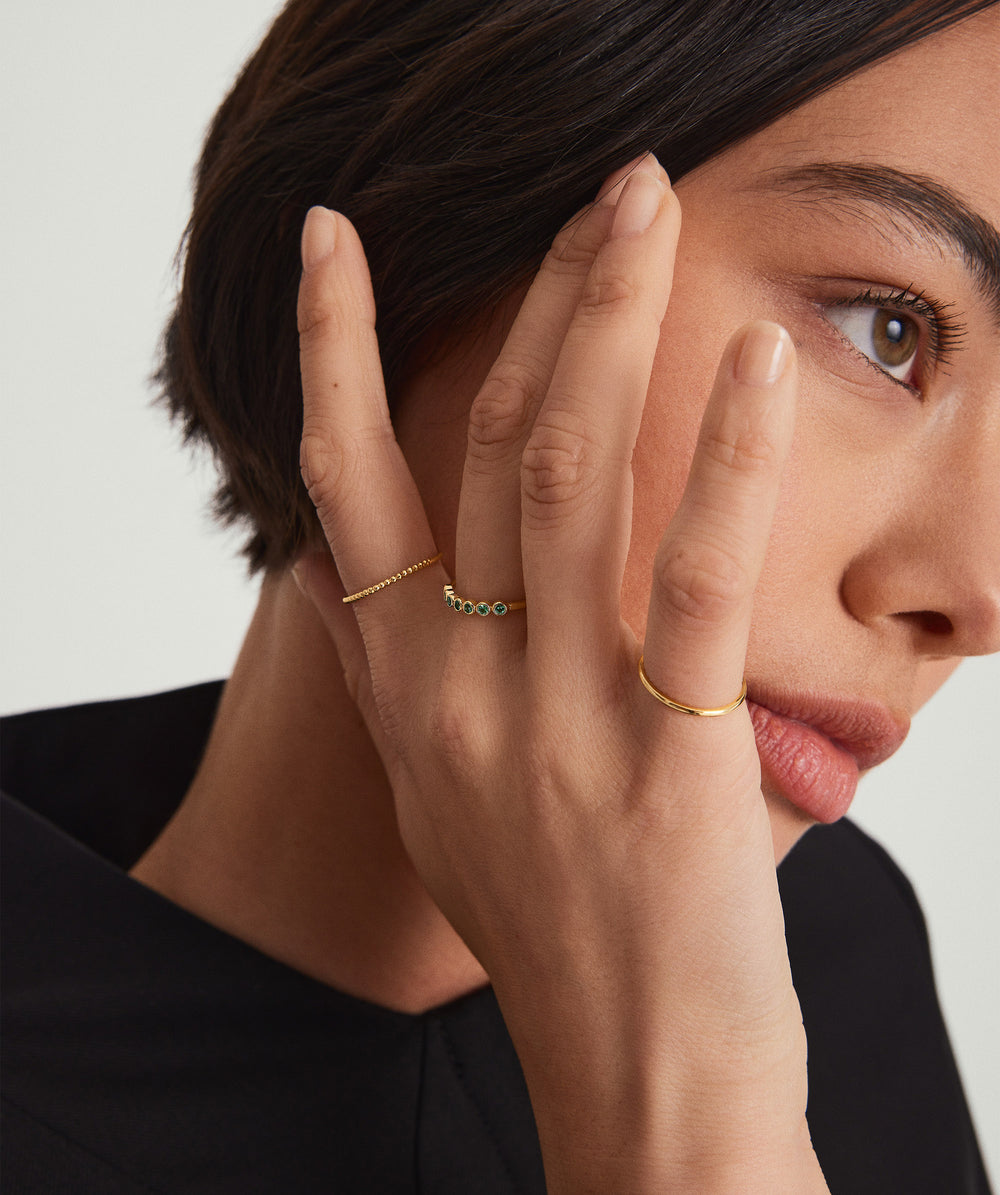 Timeless Bezel Emerald Half Eternity Band – on model