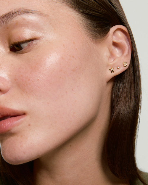 Ammonite Mini Studs – on model