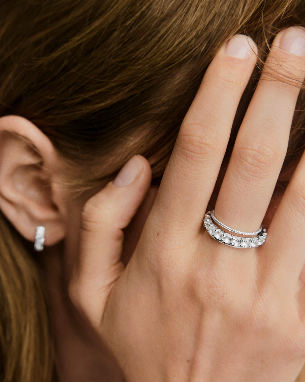 Polished Aurora Lab Grown Sapphire Eternity Ring – on model