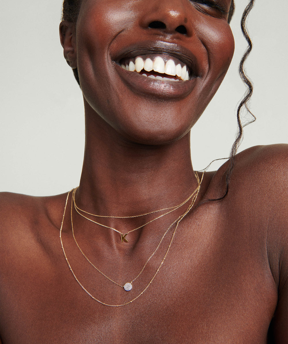 Elegant Pavé Diamond Round Necklace – on model