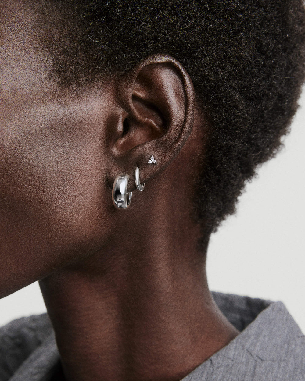 Mini Lotus Diamond Studs – on model