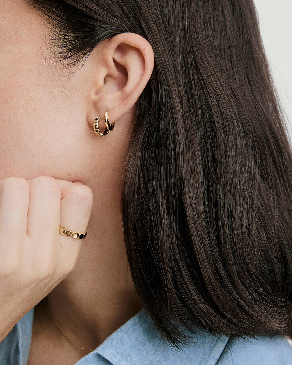Bold Texture Huggie Hoops – on model
