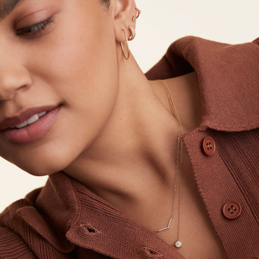 Elegant Pavé Diamond Wishbone Necklace – on model